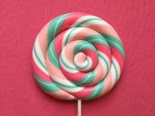 green-red-beige-and-white lollipop