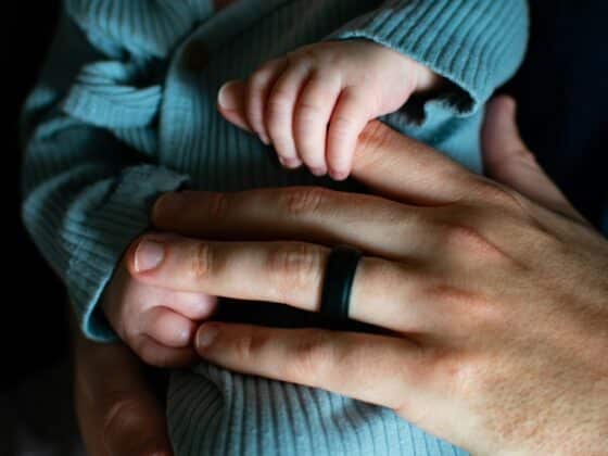 dad holding baby