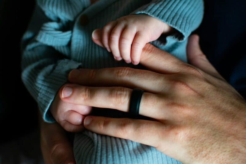 dad holding baby