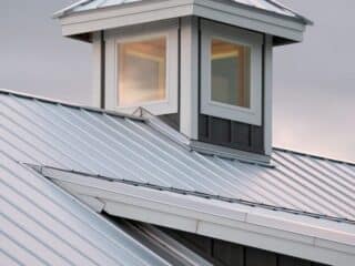 Why Metal Roofs and Impact Windows Are No Longer Optional metal roof house